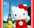 Hello Kitty με ένα πουλάκι και τον Πύργο του Άιφελ στο παρασκήνιο